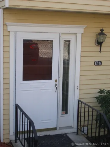 a front view of a house with a garage