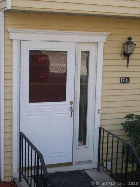 a front view of a house with a garage