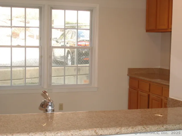 a black and white photo of a living room