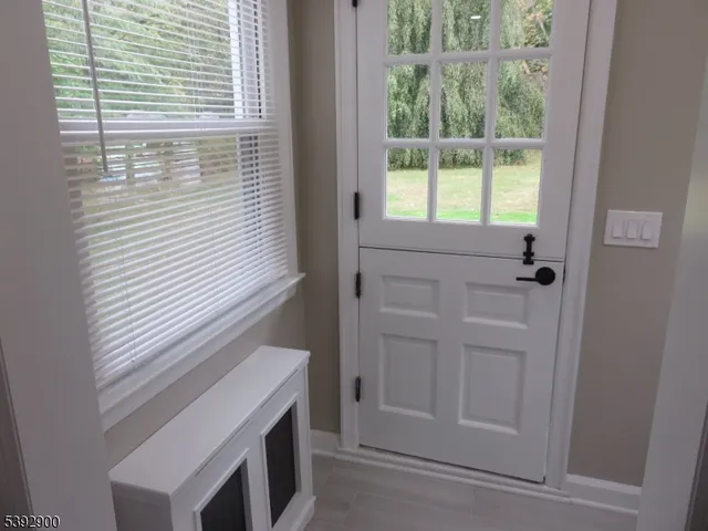 a view of an entryway with window
