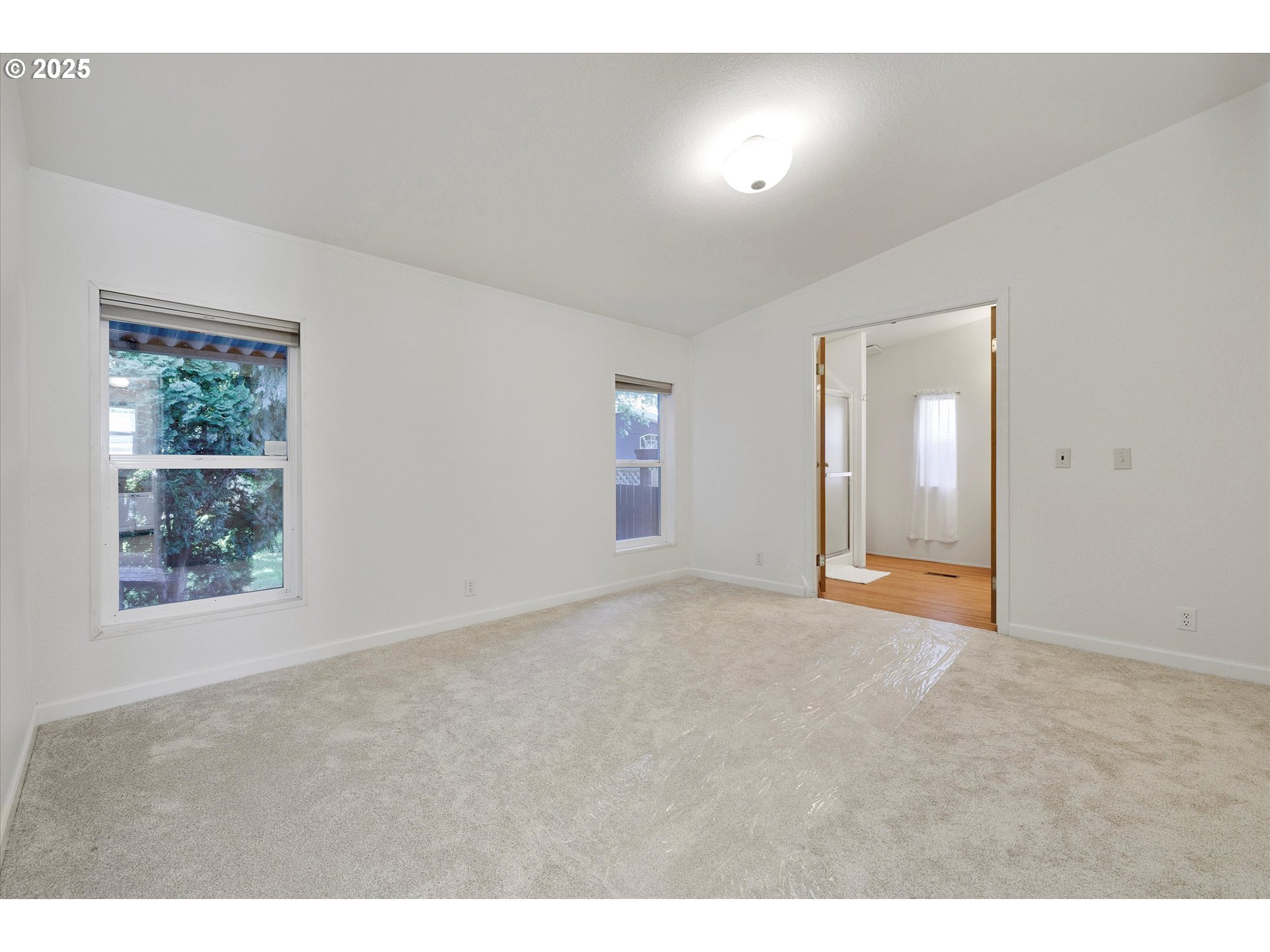 507 North 19th Avenue, Unit 60 Cornelius, OR 97113 - Photo 12 of 28 an empty room with windows and closet