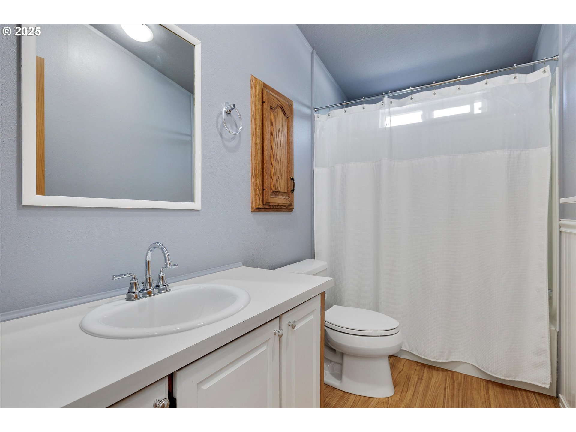 507 North 19th Avenue, Unit 60 Cornelius, OR 97113 - Photo 20 of 28 a bathroom with a sink toilet and a mirror