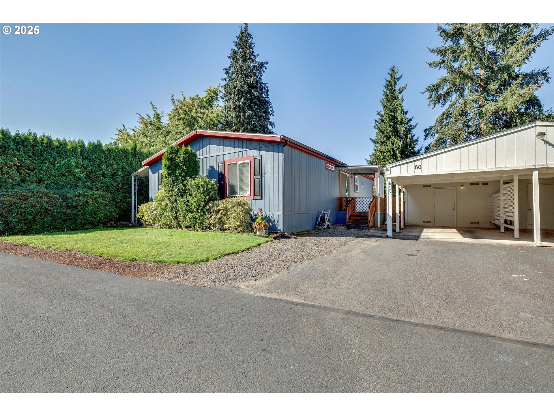507 North 19th Avenue, Unit 60 Cornelius, OR 97113 - Photo 2 of 28 a view of a house with a yard and potted plants