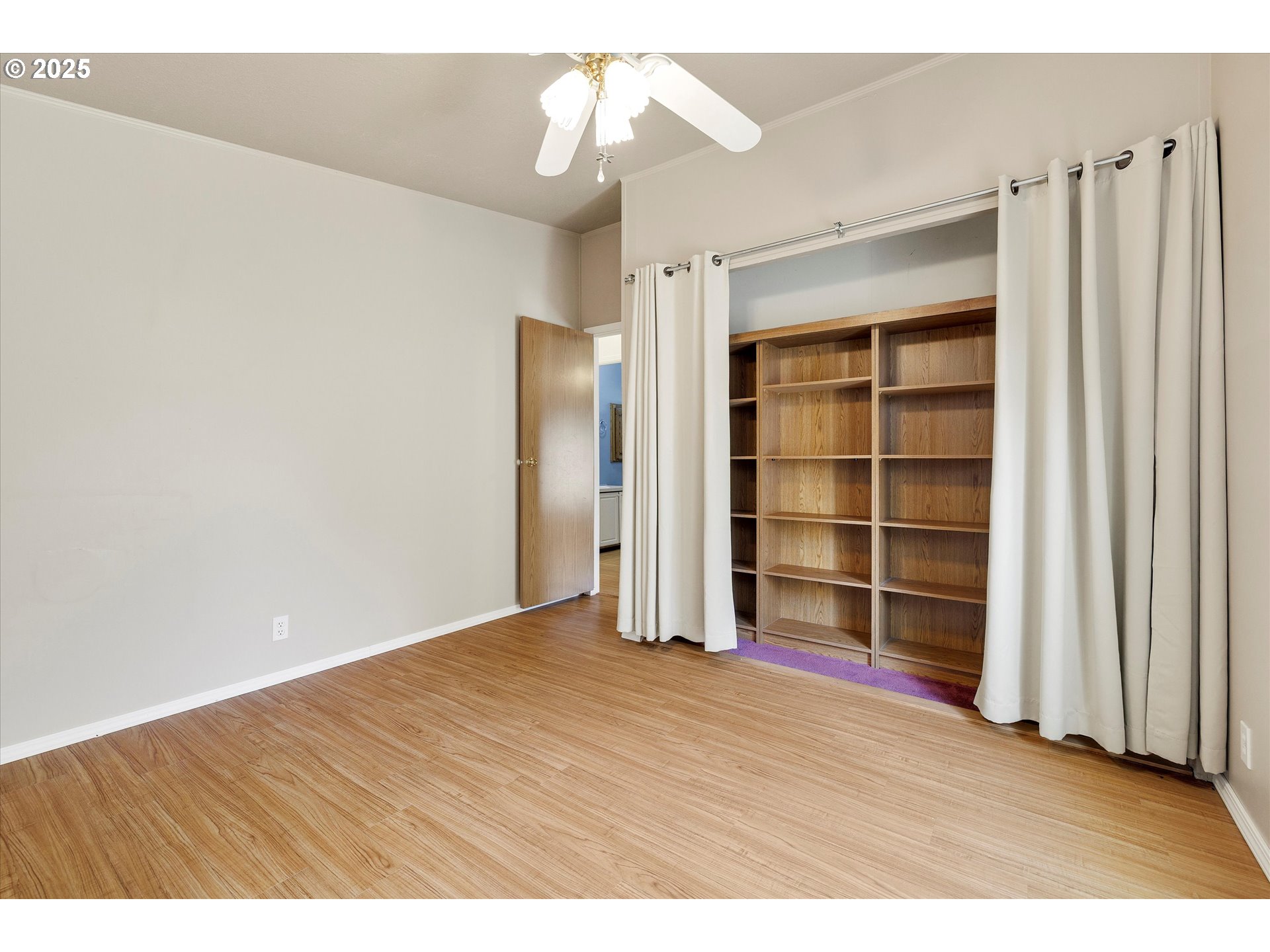 507 North 19th Avenue, Unit 60 Cornelius, OR 97113 - Photo 22 of 28 a view of an empty room with a empty shelves