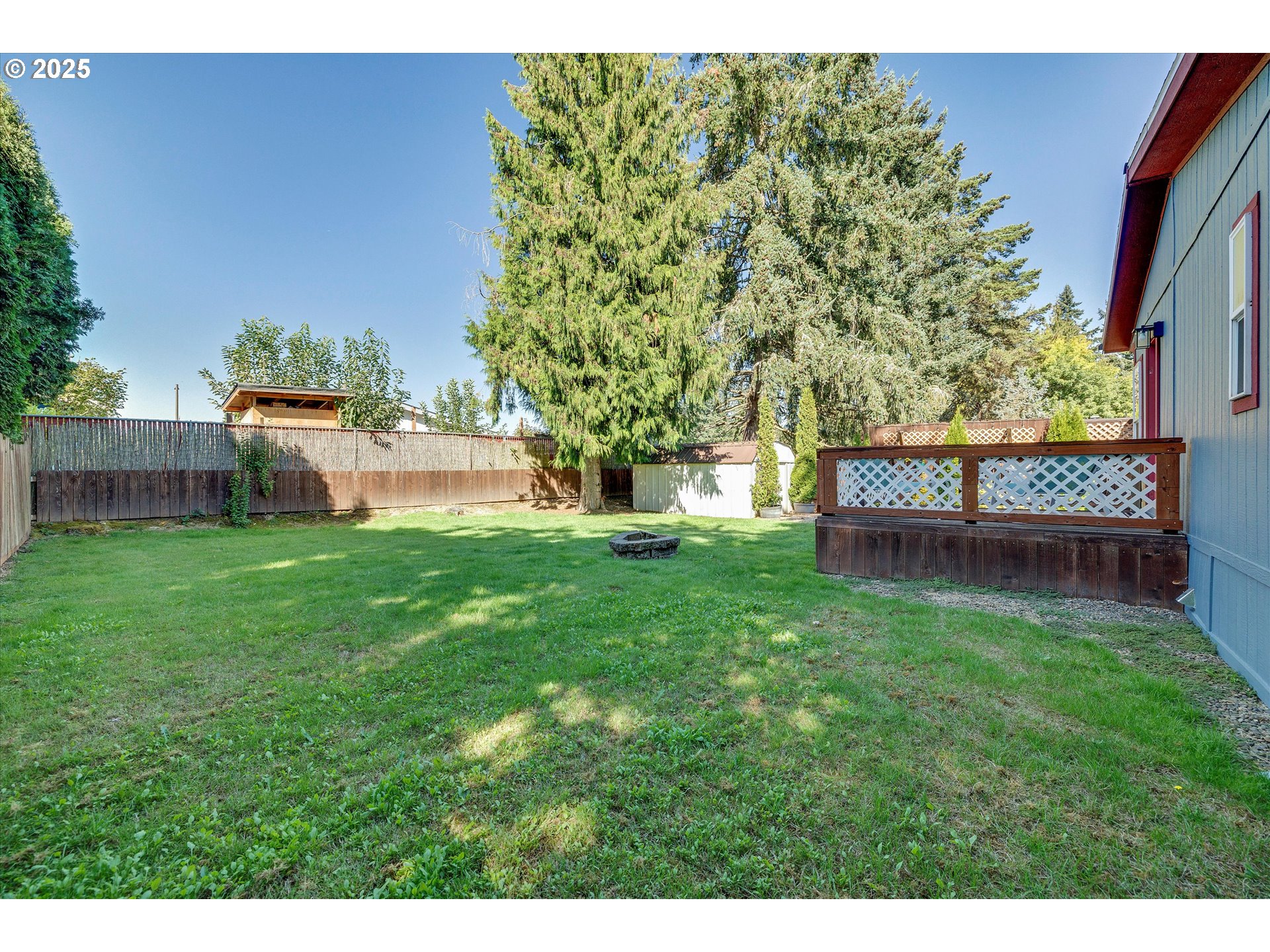 507 North 19th Avenue, Unit 60 Cornelius, OR 97113 - Photo 27 of 28 a view of an house with backyard and a tree