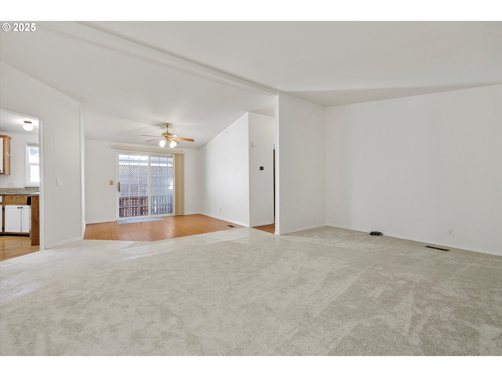 507 North 19th Avenue, Unit 60 Cornelius, OR 97113 - Photo 5 of 28 a view of an empty room with a window