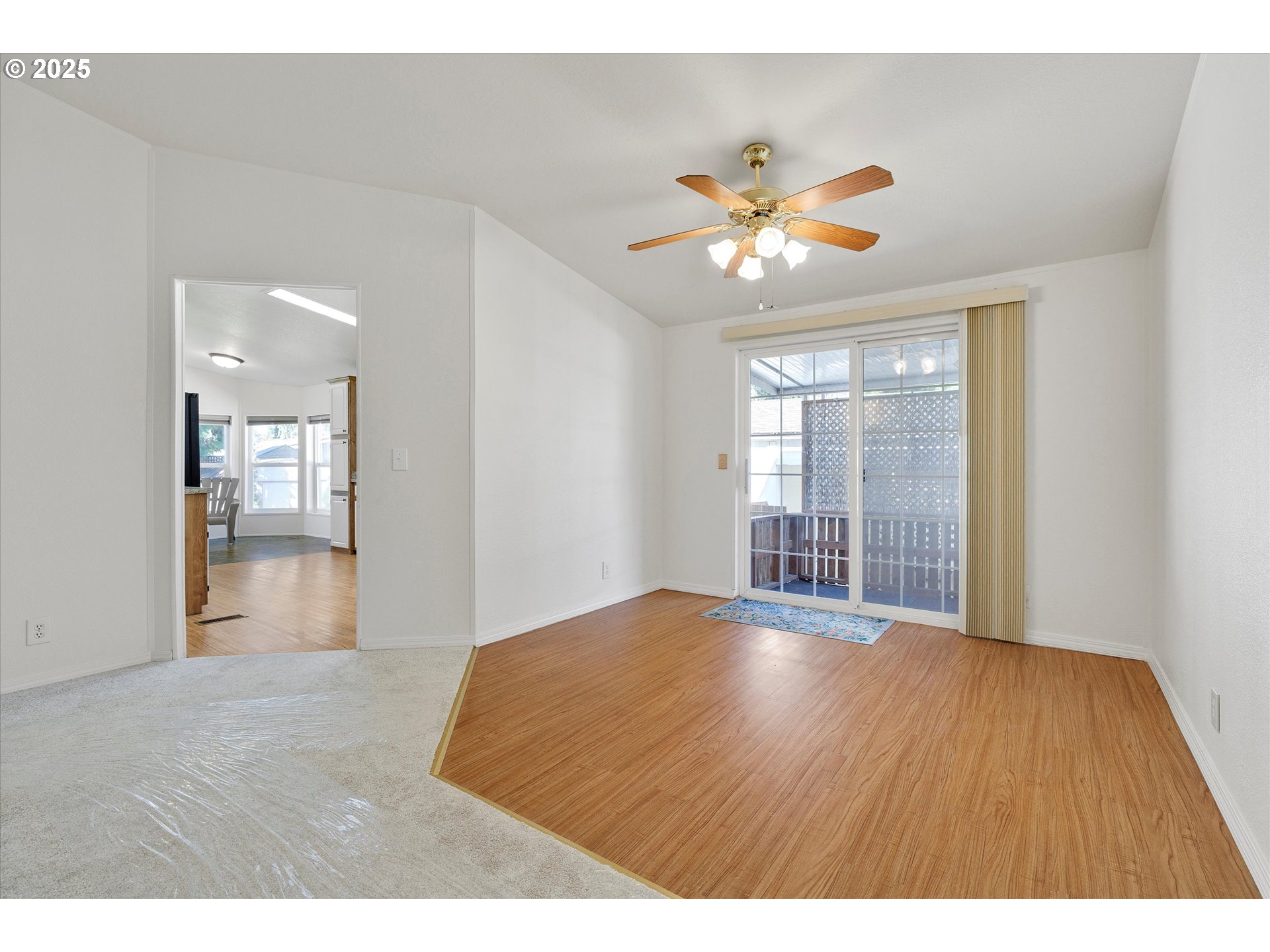 507 North 19th Avenue, Unit 60 Cornelius, OR 97113 - Photo 7 of 28 a view of an empty room with a window