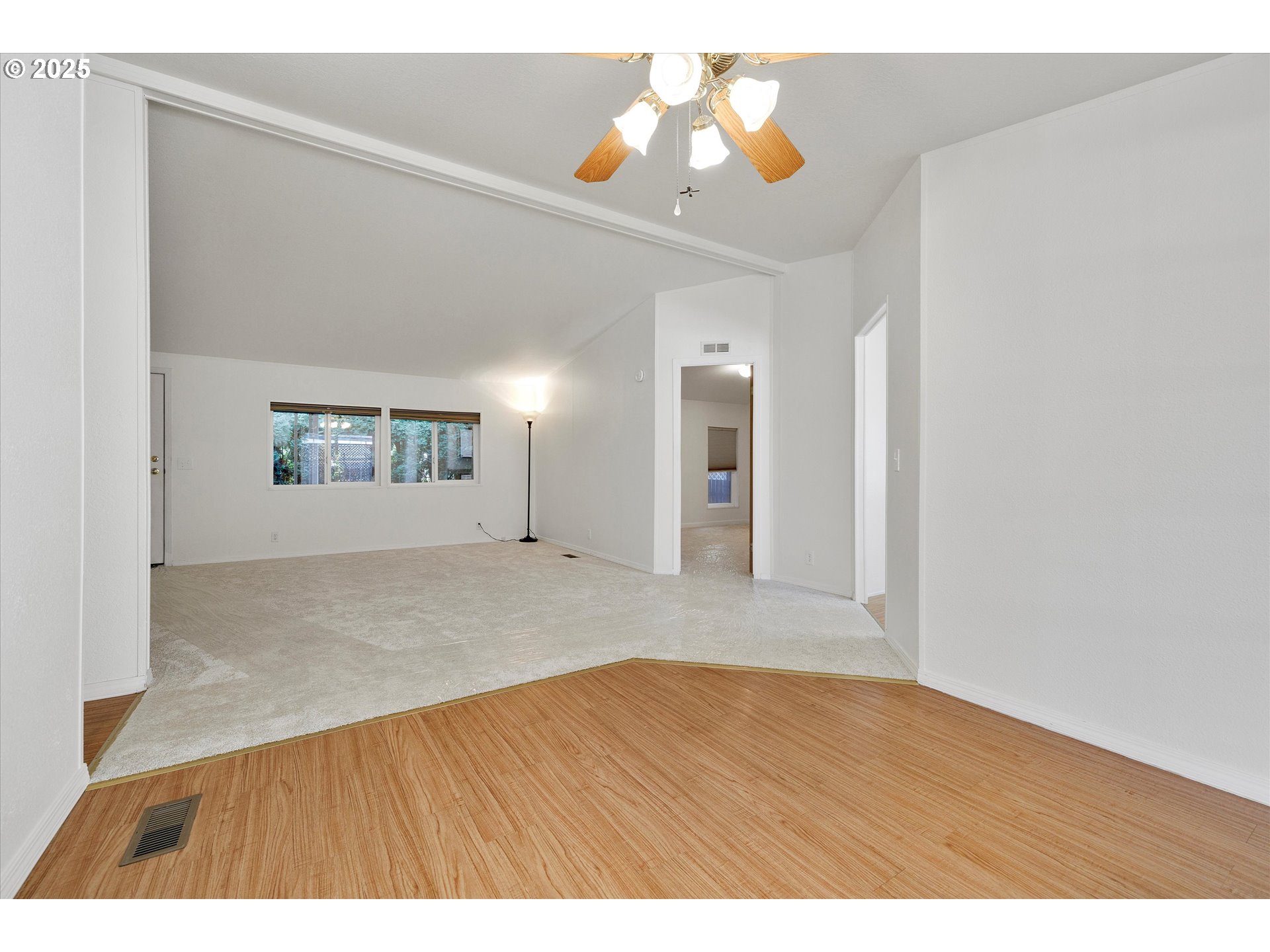 507 North 19th Avenue, Unit 60 Cornelius, OR 97113 - Photo 8 of 28 wooden floor in an empty room with a window