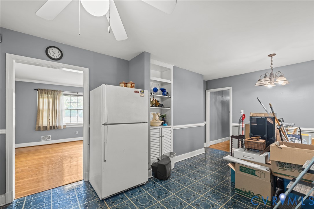 2405 Dumbarton Road Henrico, VA 23228 - Photo 22 of 34 Built-in shelving, tile flooring, ceiling fan, and