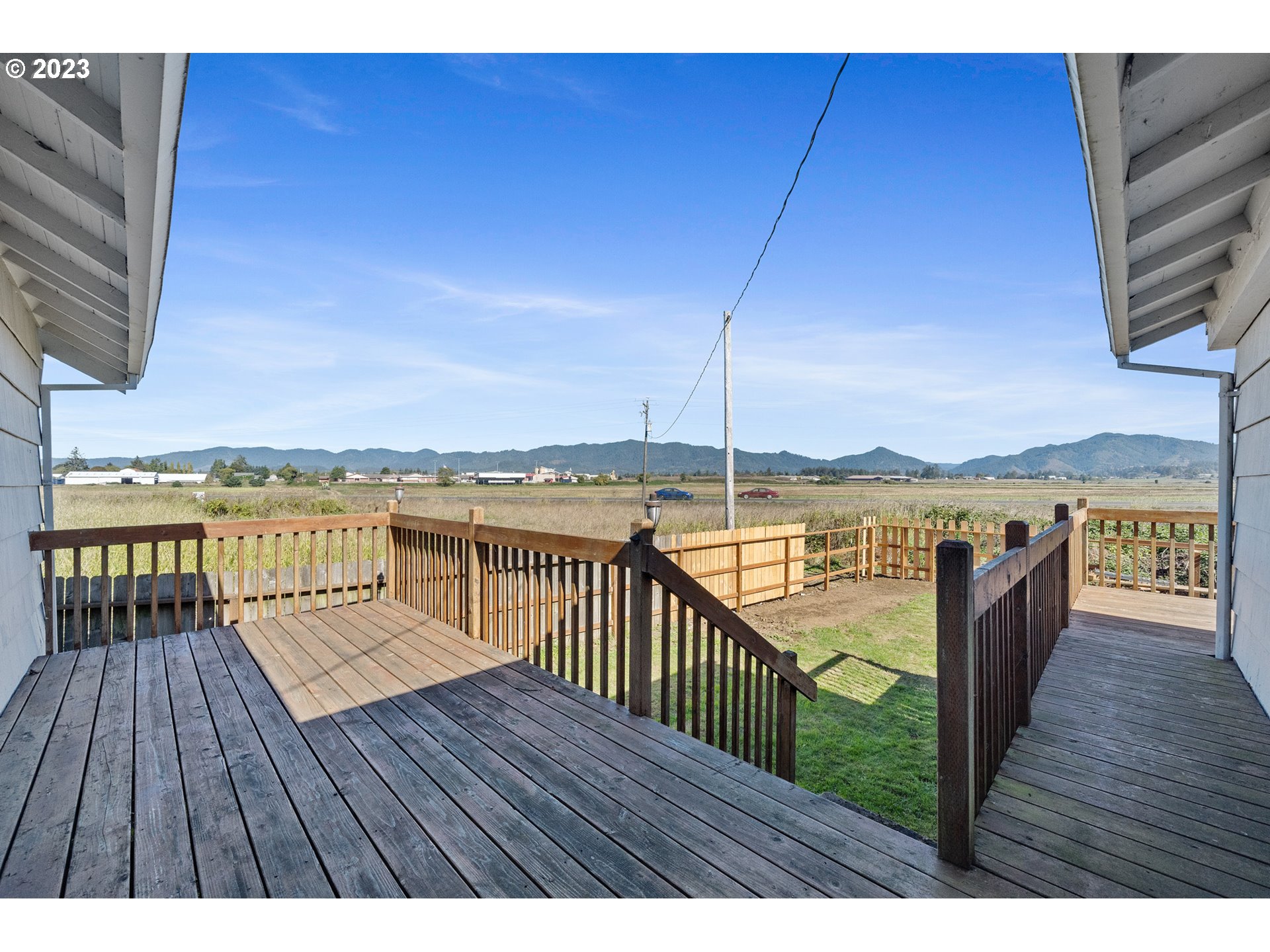 2450 Nielsen Road Tillamook, OR 97141 - Photo 4 of 22 a view of balcony with wooden floor and outdoor space