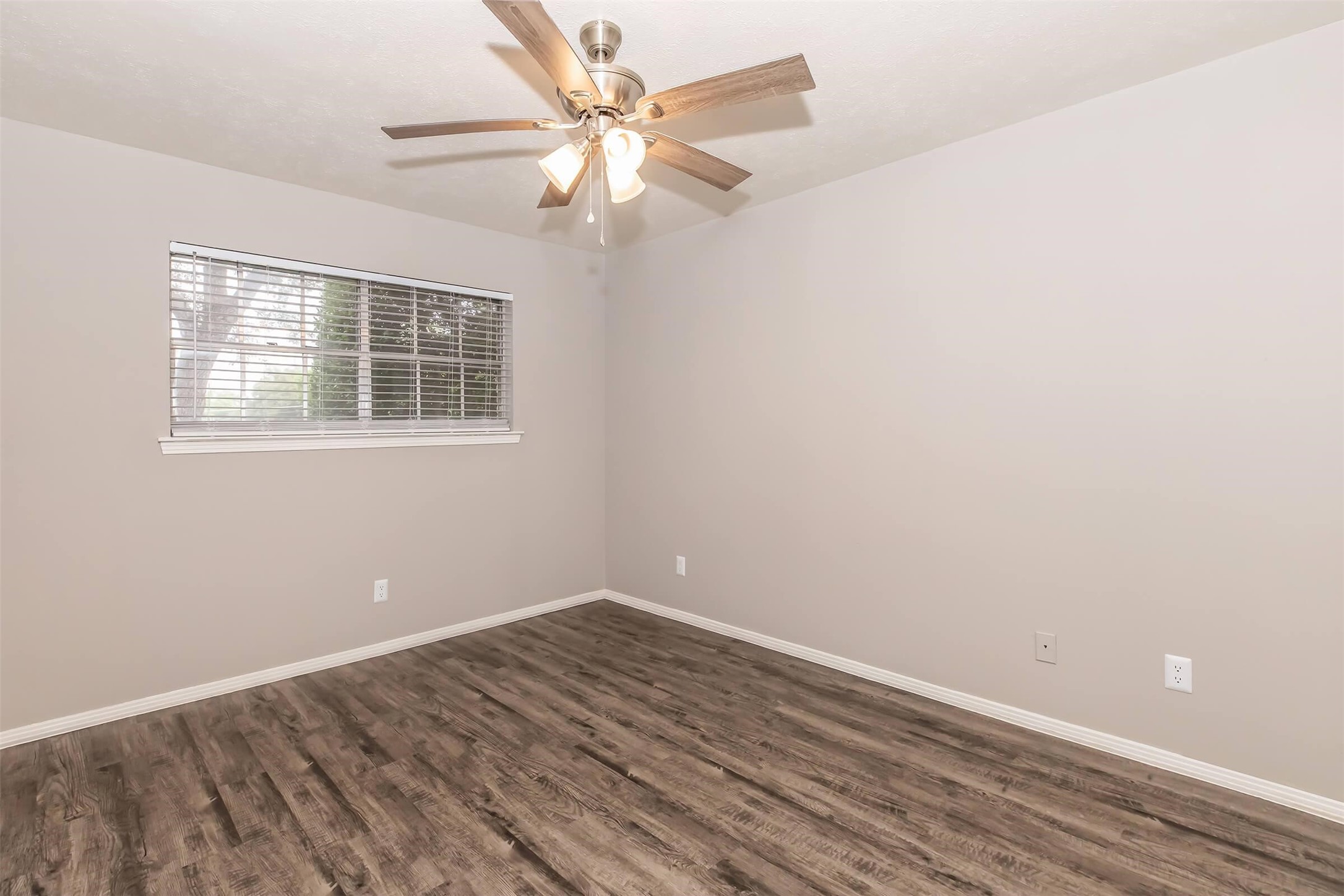 1212 Hampshire Lane, Unit 1322 Richardson, TX 75080 - Photo 31 of 50 wooden floor in an empty room with a window