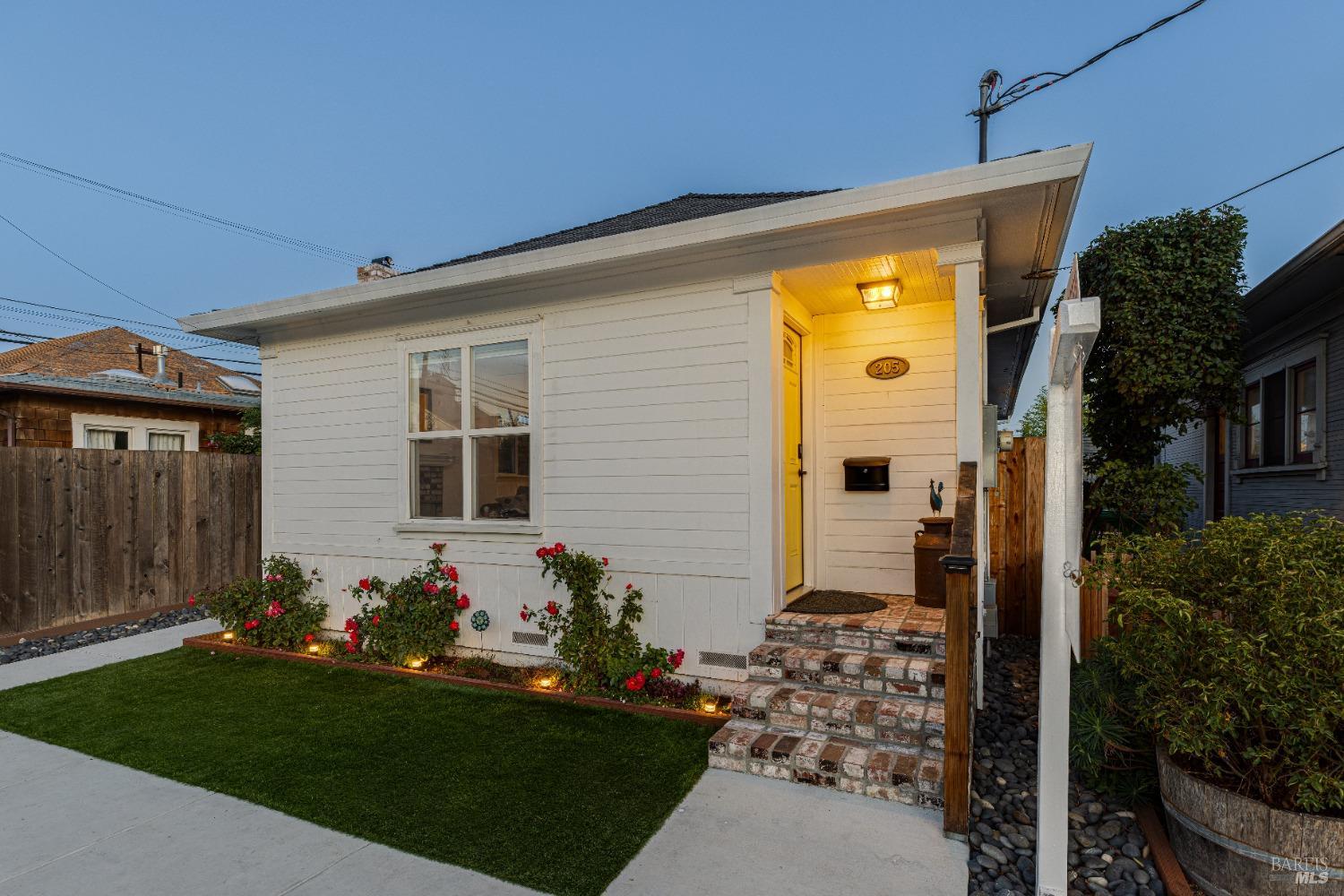 205 E Street Petaluma, CA 94952 - Photo 1 of 1 a front view of house with yard