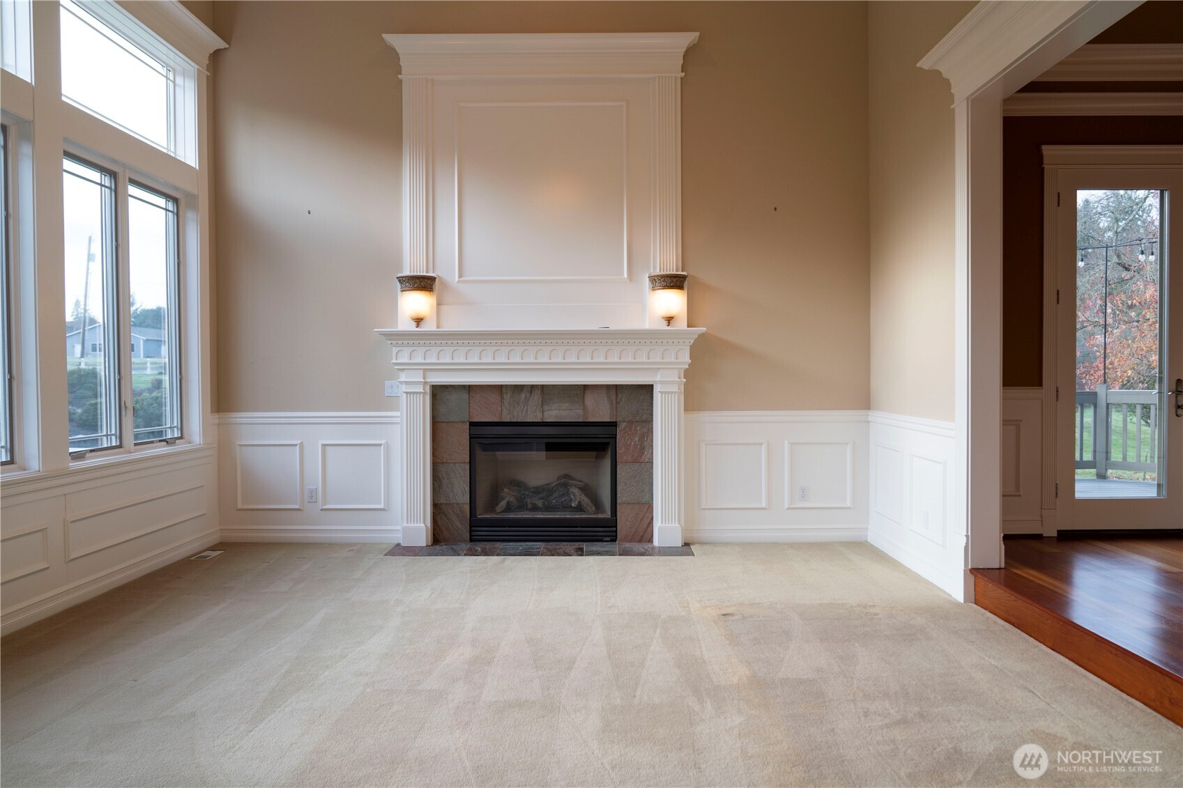 9701 148th Street Southeast Snohomish, WA 98296 - Photo 13 of 18 a view of an empty room with a window and fireplace