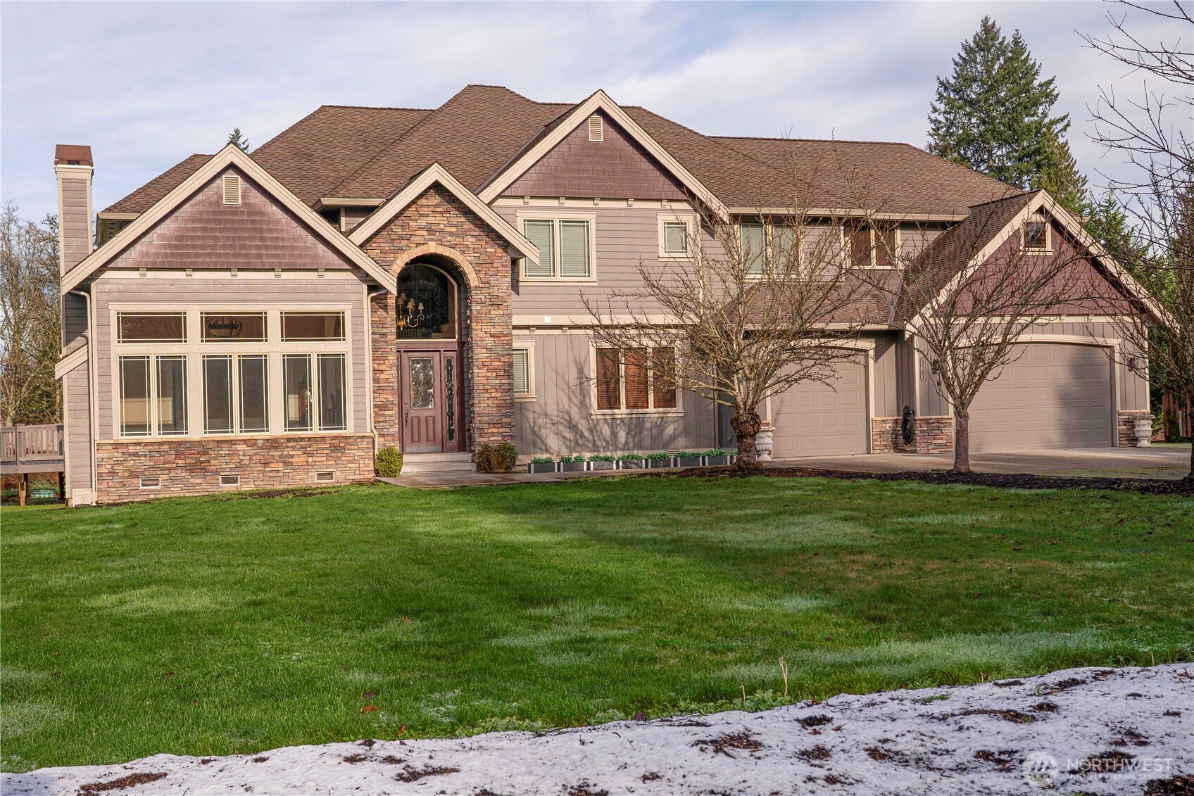 9701 148th Street Southeast Snohomish, WA 98296 - Photo 2 of 18 a front view of a house with a garden