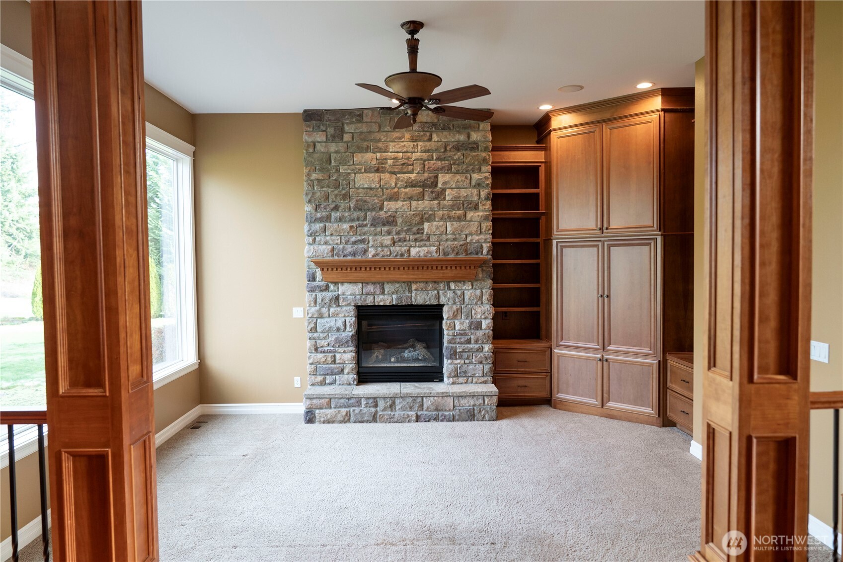 9701 148th Street Southeast Snohomish, WA 98296 - Photo 8 of 18 a living room with furniture and a fireplace