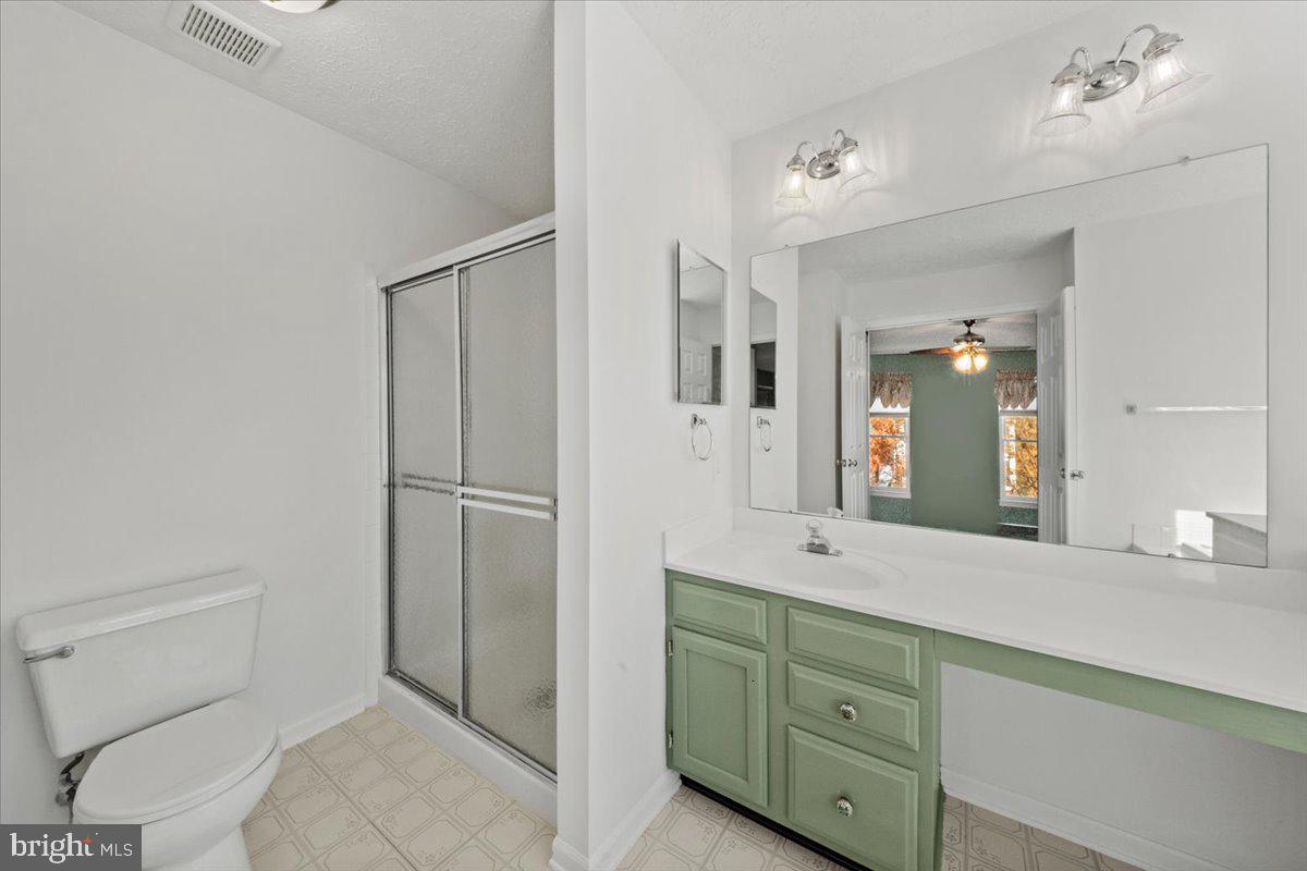 304 Hialeah Drive Mount Laurel, NJ 08054 - Photo 27 of 57 a bathroom with a double vanity sink and mirror