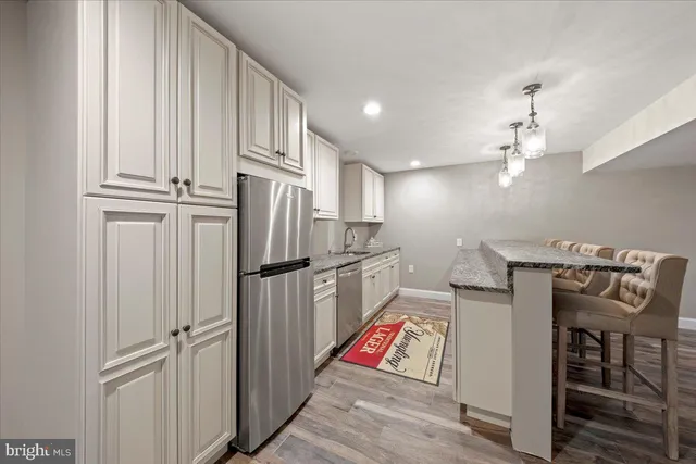 a view of entryway with wooden floor