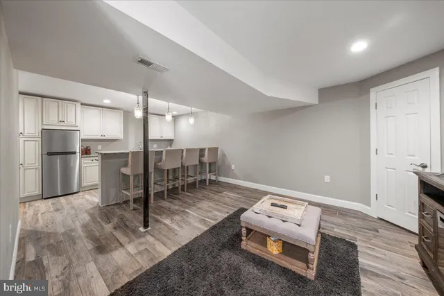 a bathroom with a toilet a sink and garden