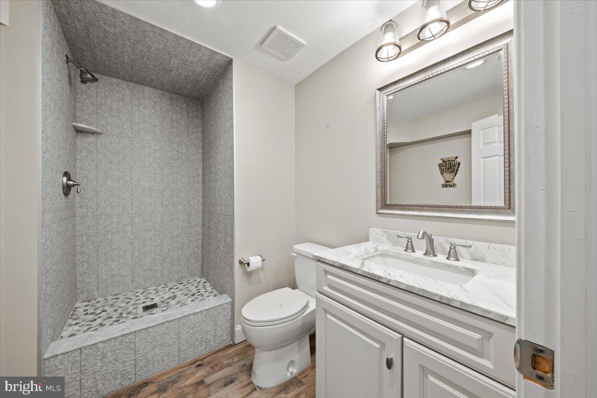 304 Hialeah Drive Mount Laurel, NJ 08054 - Photo 46 of 57 a bathroom with a sink a toilet and shower