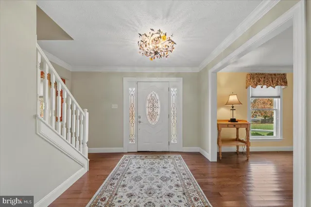 a view interior of a house wooden floor and a chandelier