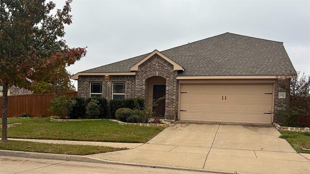 2101 Long Forest Road Forney, TX 75126 - Photo 2 of 15 front view of house with a yard