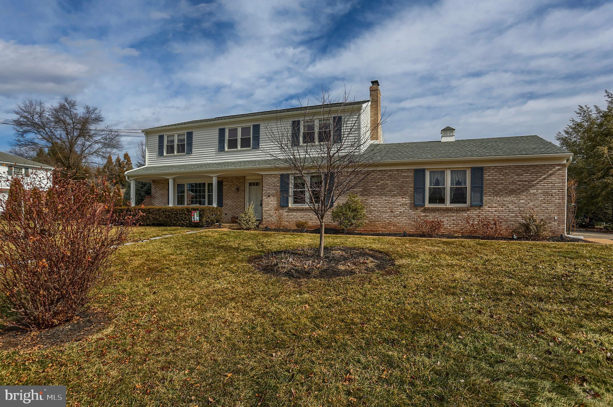 2301 Birch Road York, PA 17408 - Photo 3 of 40 a large brick building with a big yard and large trees