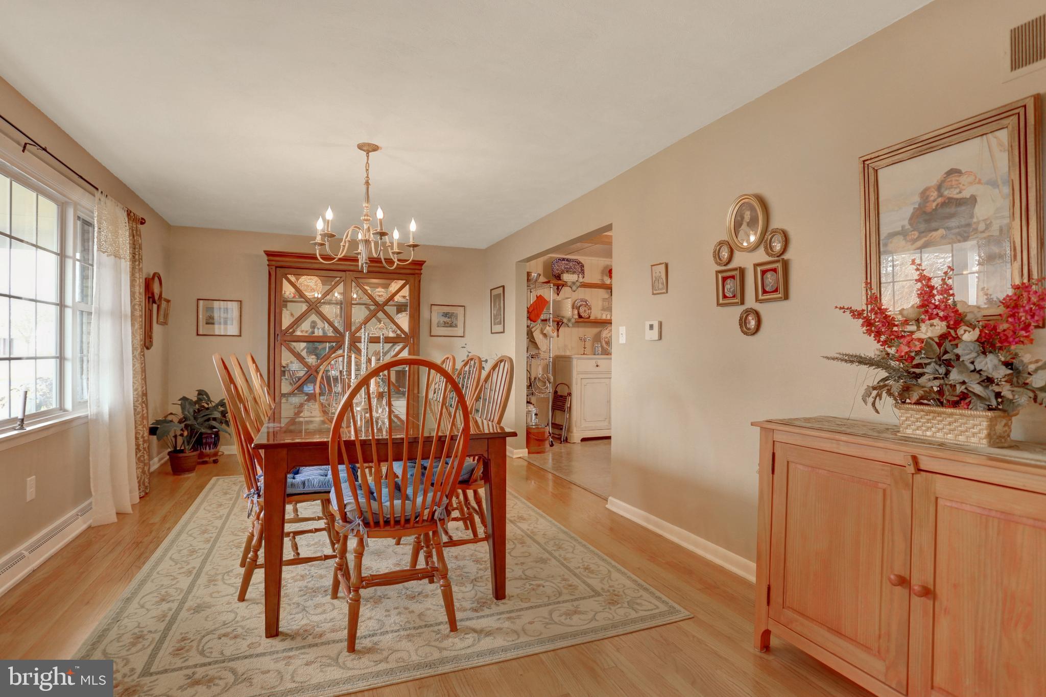 2301 Birch Road York, PA 17408 - Photo 21 of 40 a view of a dining room with furniture and chandelier