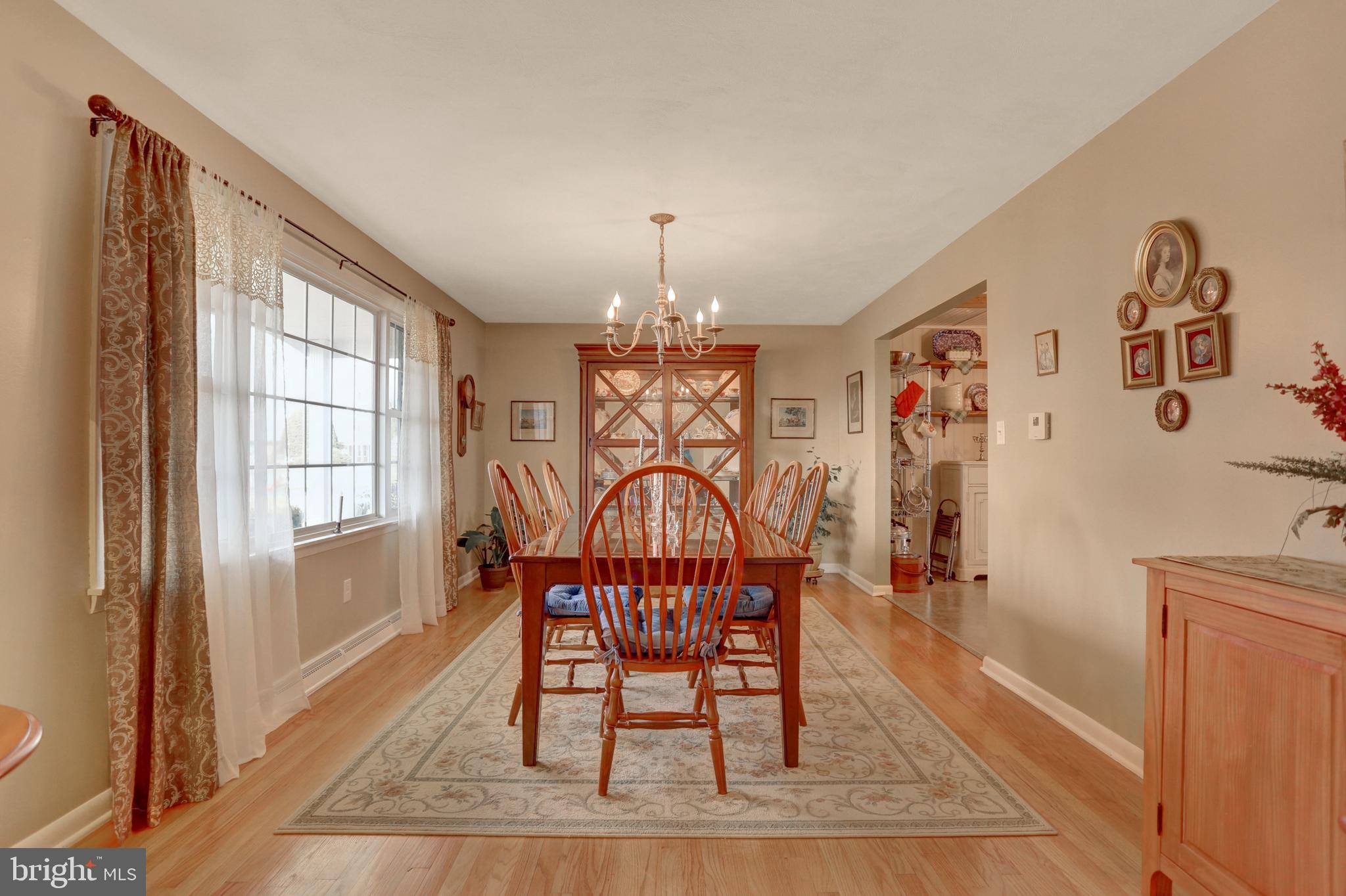 2301 Birch Road York, PA 17408 - Photo 22 of 40 a view of a dining room with furniture window and wooden floor