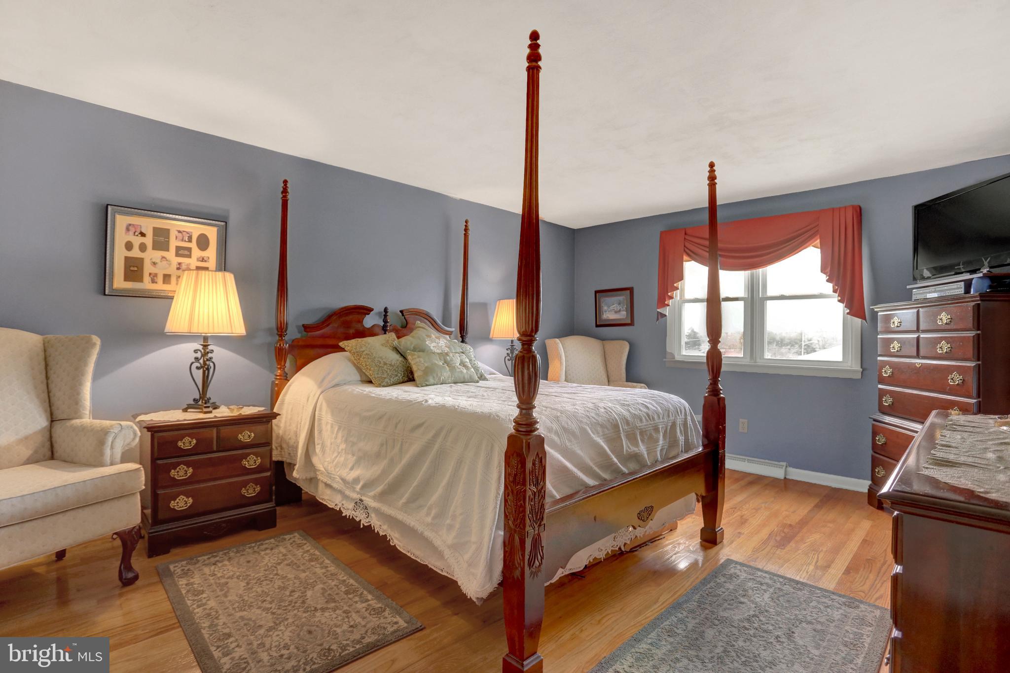 2301 Birch Road York, PA 17408 - Photo 24 of 40 a bedroom with a bed a couch and dresser
