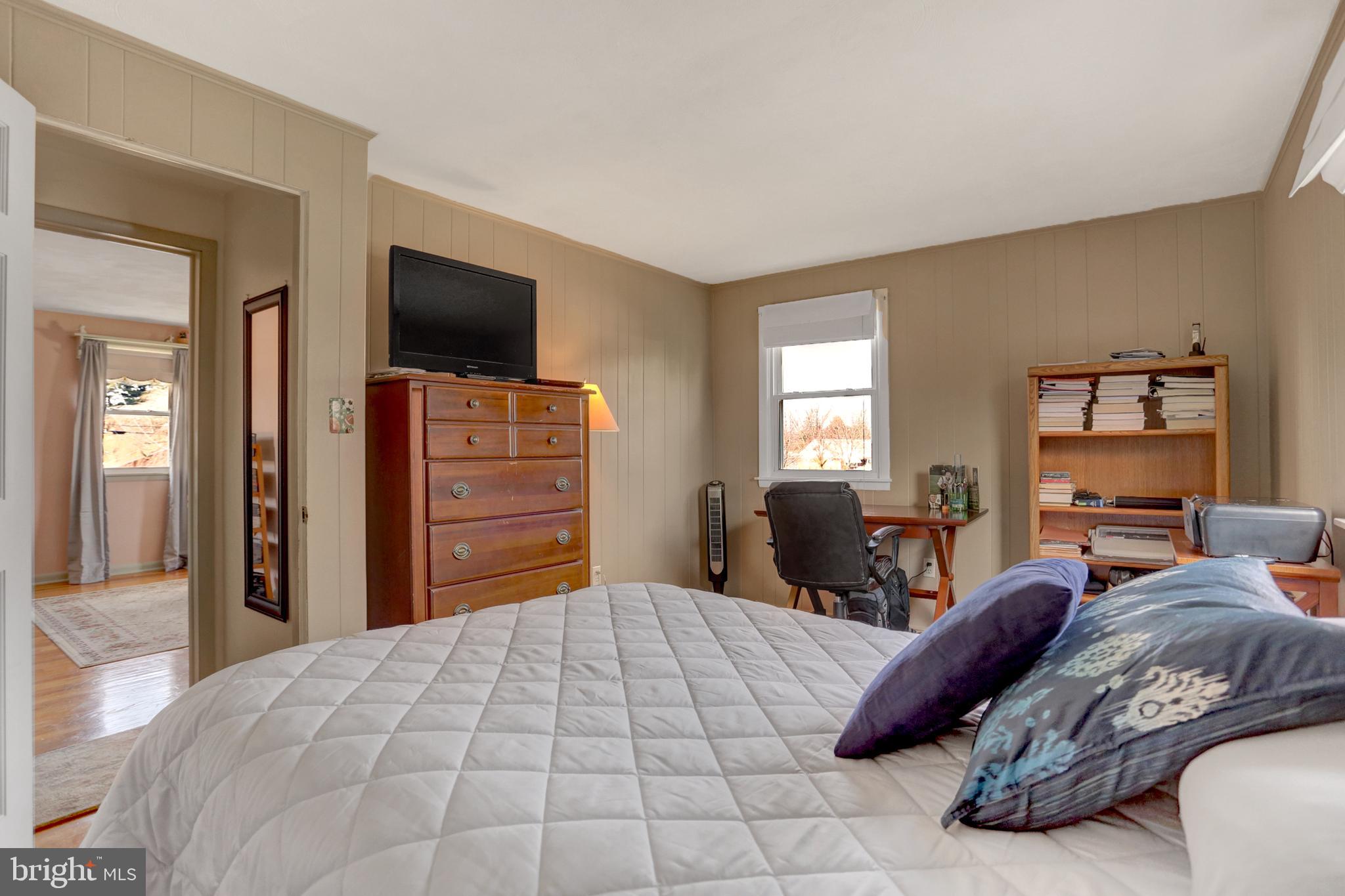 2301 Birch Road York, PA 17408 - Photo 29 of 40 a bedroom with a bed and wooden floor