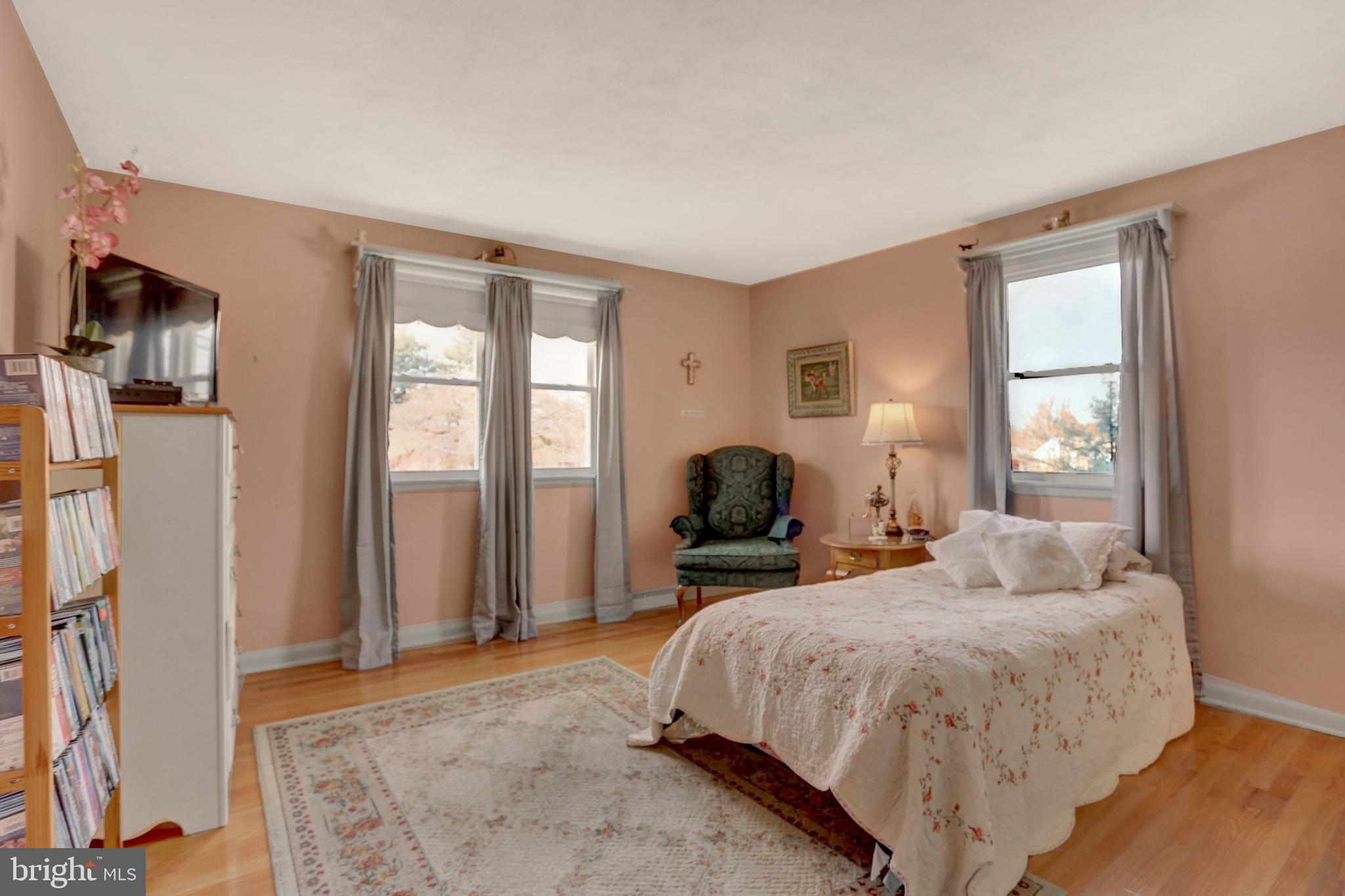 2301 Birch Road York, PA 17408 - Photo 31 of 40 a bedroom with a bed and large windows