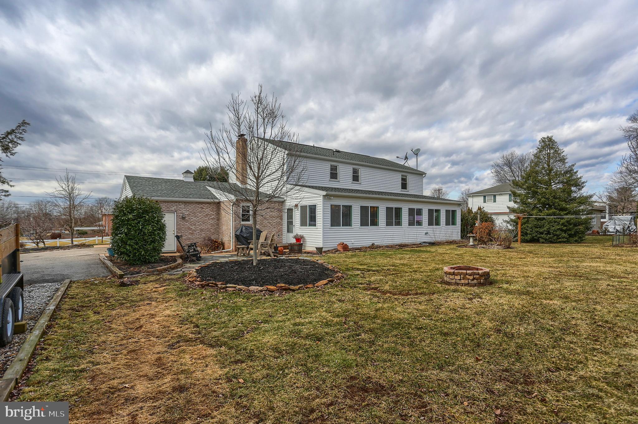 2301 Birch Road York, PA 17408 - Photo 36 of 40 a front view of a house with garden