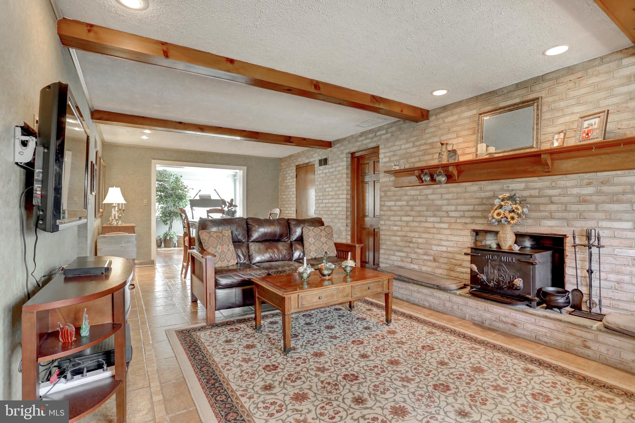 2301 Birch Road York, PA 17408 - Photo 6 of 40 a living room with furniture and a fireplace