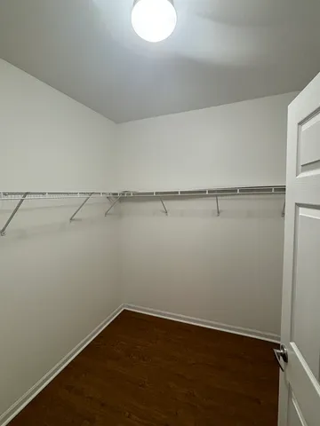 a view of an empty walk in closet