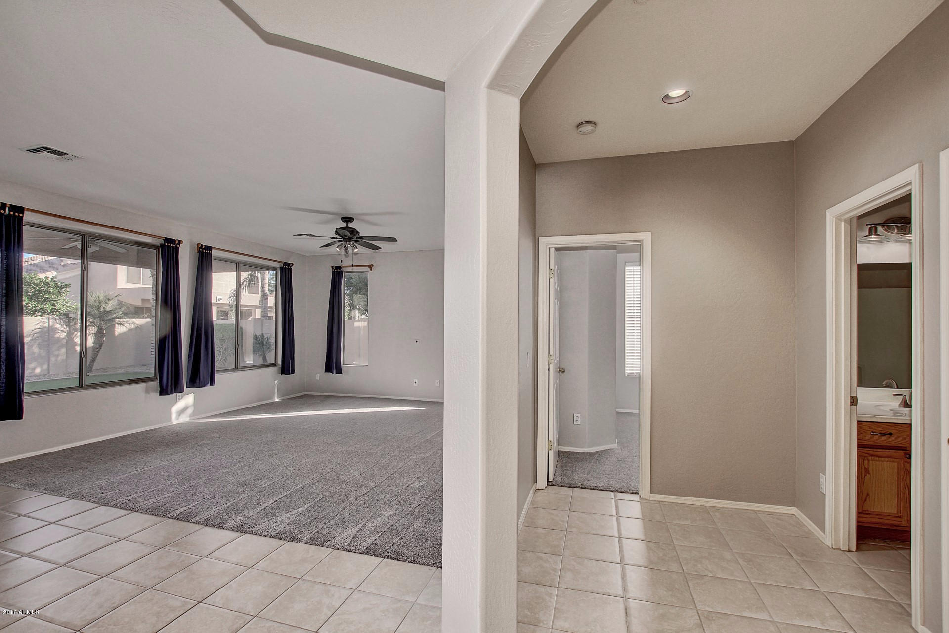 1360 East Harrison Street Gilbert, AZ 85295 - Photo 11 of 34 a view of a hallway with bathroom and shower