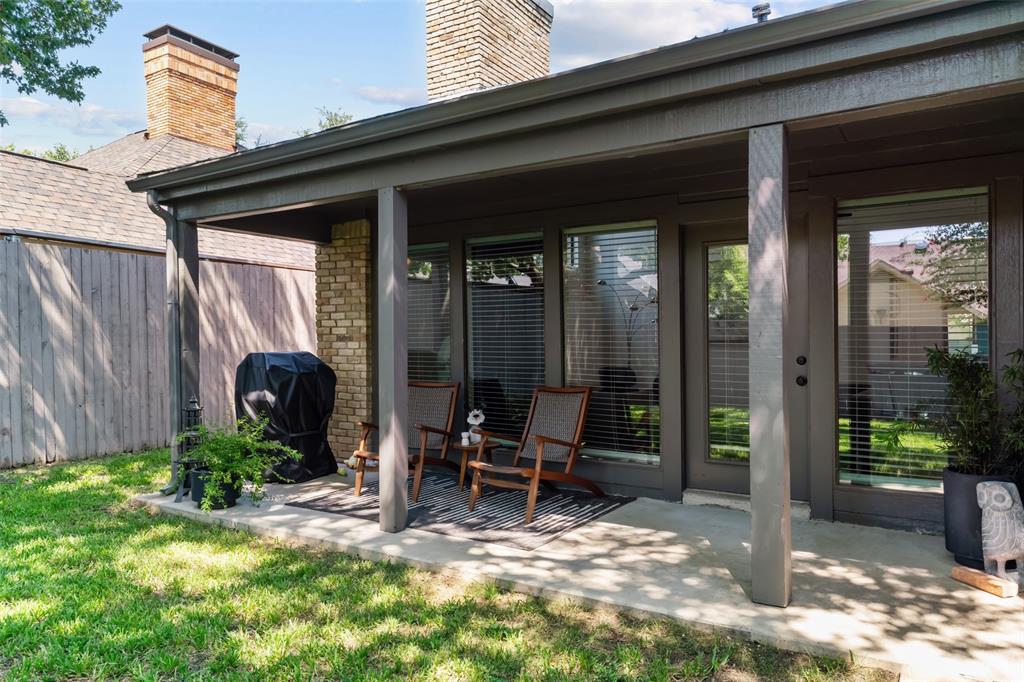 4304 Cobblers Lane Dallas, TX 75287 - Photo 25 of 31 a backyard of a house with seating space