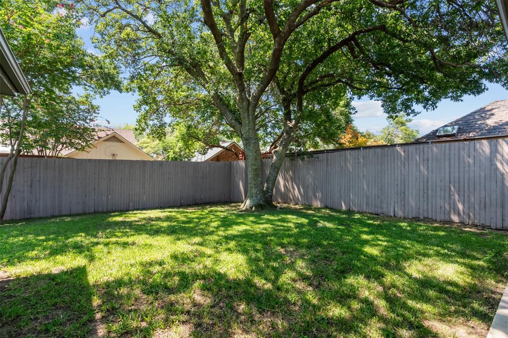 4304 Cobblers Lane Dallas, TX 75287 - Photo 28 of 31 a view of backyard with tree