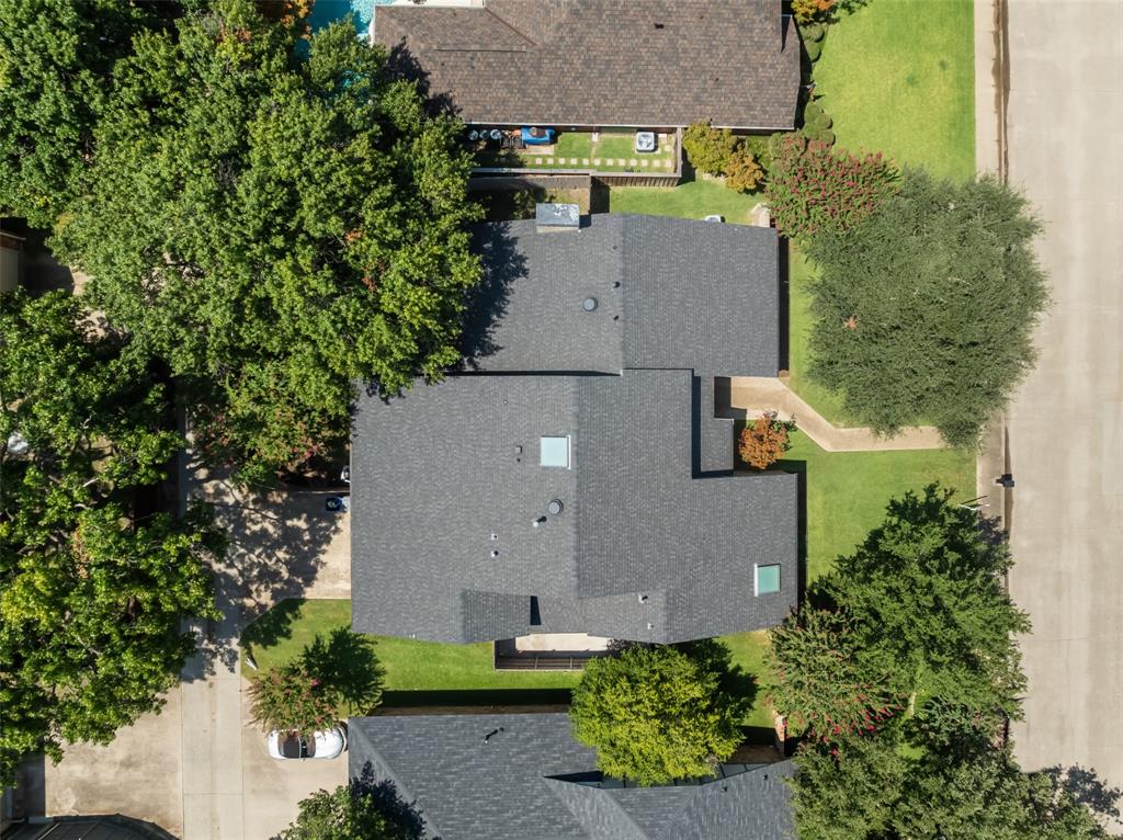 4304 Cobblers Lane Dallas, TX 75287 - Photo 31 of 31 an aerial view of multiple houses with a yard