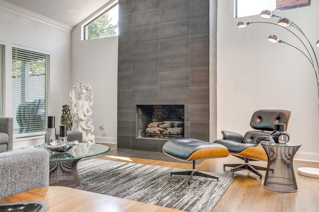 4304 Cobblers Lane Dallas, TX 75287 - Photo 4 of 31 a living room with furniture and wooden floor