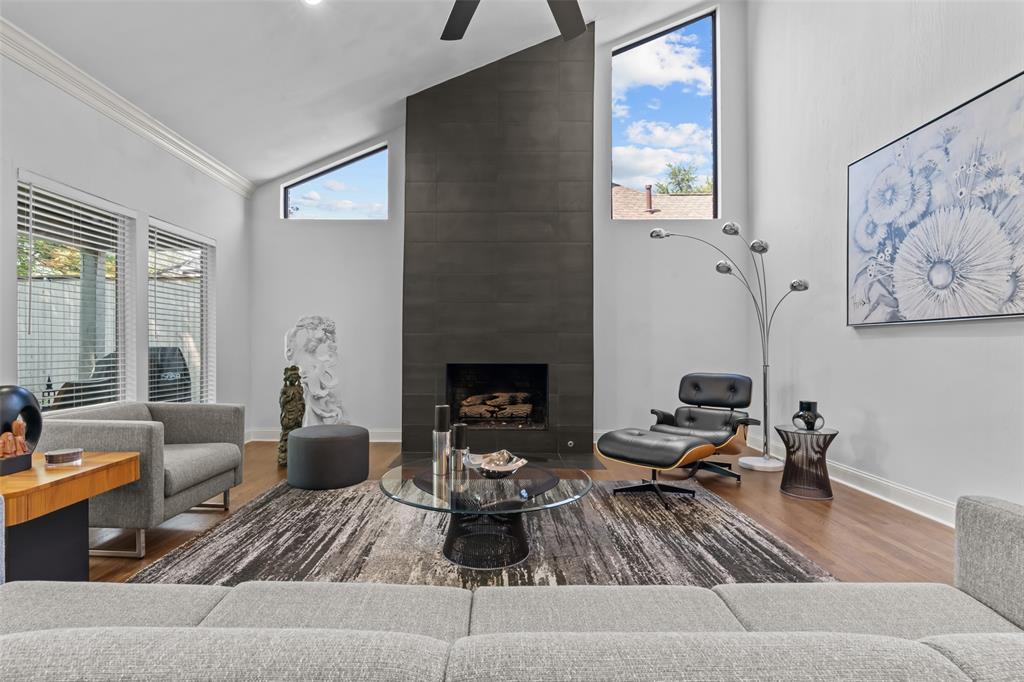 4304 Cobblers Lane Dallas, TX 75287 - Photo 5 of 31 a living room with furniture fireplace and window