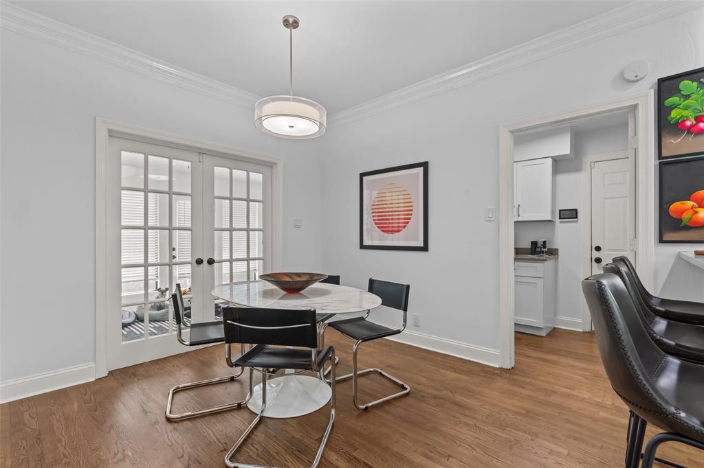 4304 Cobblers Lane Dallas, TX 75287 - Photo 9 of 31 a living room with furniture a window and a flat screen tv