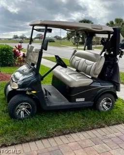 a view of a house with a yard and plants