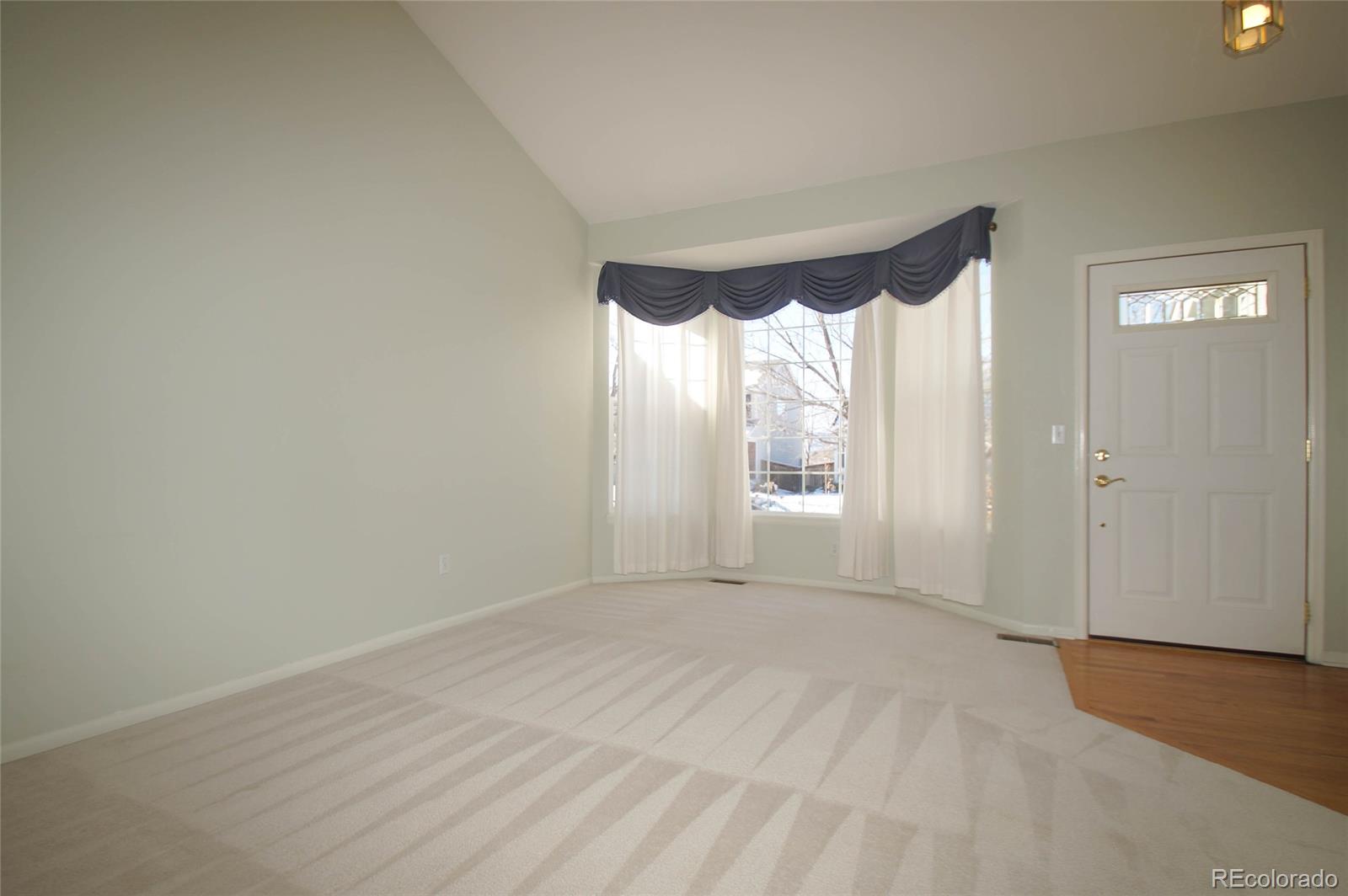 9638 Silverberry Circle Highlands Ranch, CO 80129 - Photo 11 of 27 a view of an empty room with a window