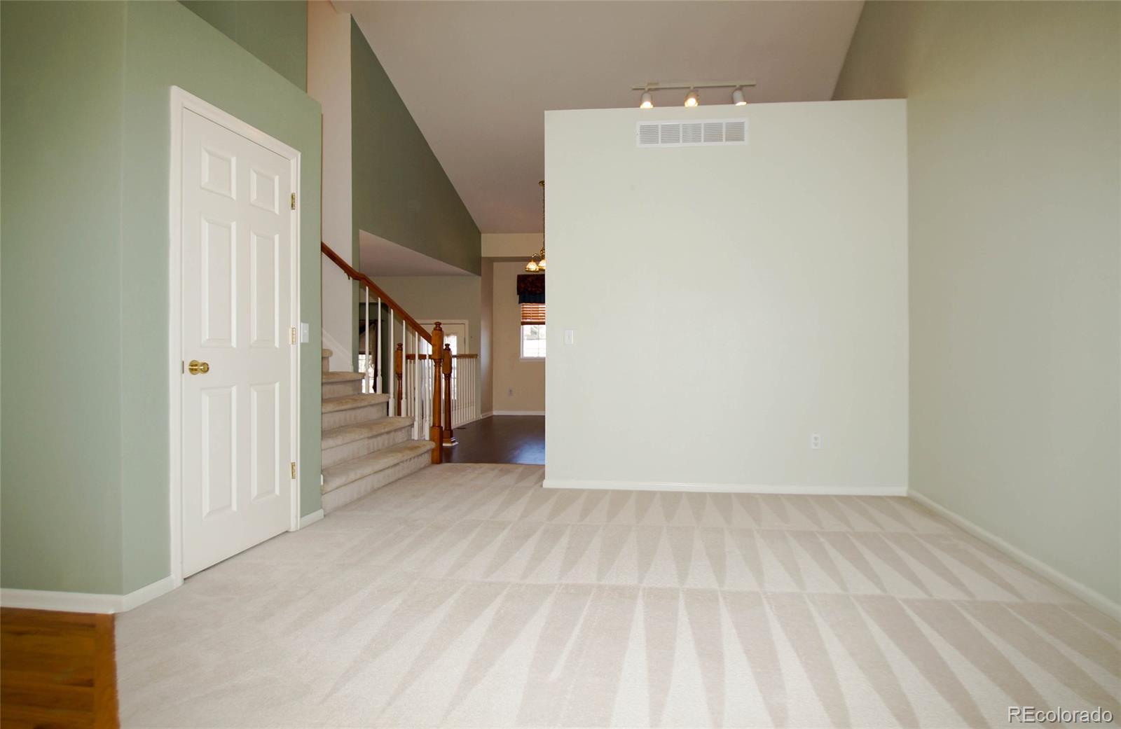 9638 Silverberry Circle Highlands Ranch, CO 80129 - Photo 14 of 27 a view of a hallway with closet