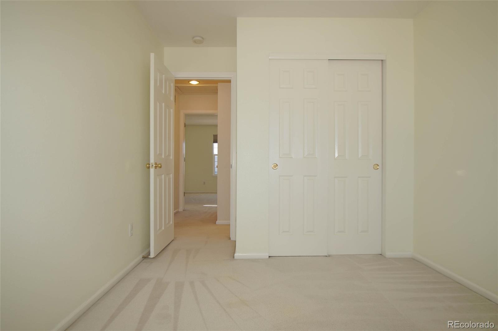9638 Silverberry Circle Highlands Ranch, CO 80129 - Photo 16 of 27 a view of an empty room