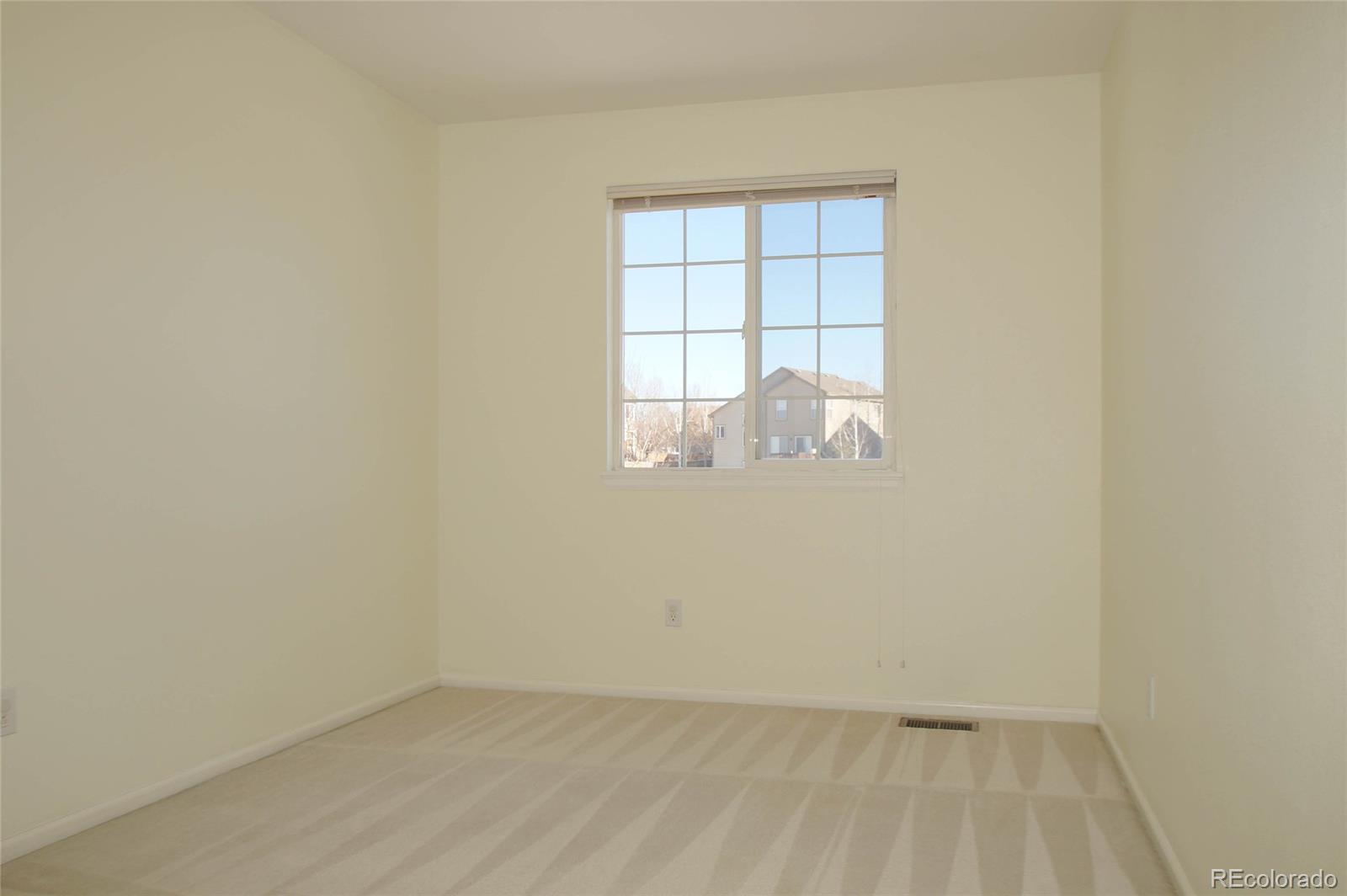 9638 Silverberry Circle Highlands Ranch, CO 80129 - Photo 18 of 27 wooden floor in an empty room