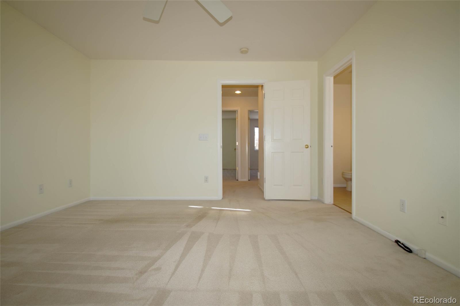 9638 Silverberry Circle Highlands Ranch, CO 80129 - Photo 19 of 27 a view of an empty room and closet area