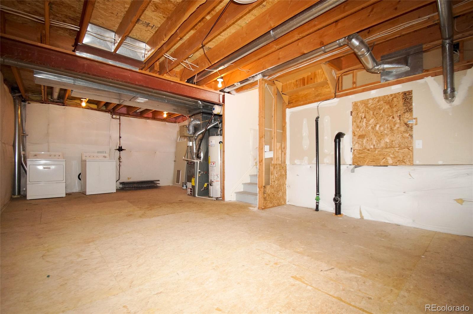 9638 Silverberry Circle Highlands Ranch, CO 80129 - Photo 24 of 27 a view of a room with wooden walls