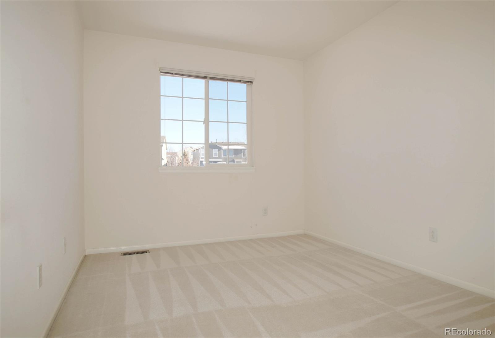 9638 Silverberry Circle Highlands Ranch, CO 80129 - Photo 26 of 27 an empty room with a window