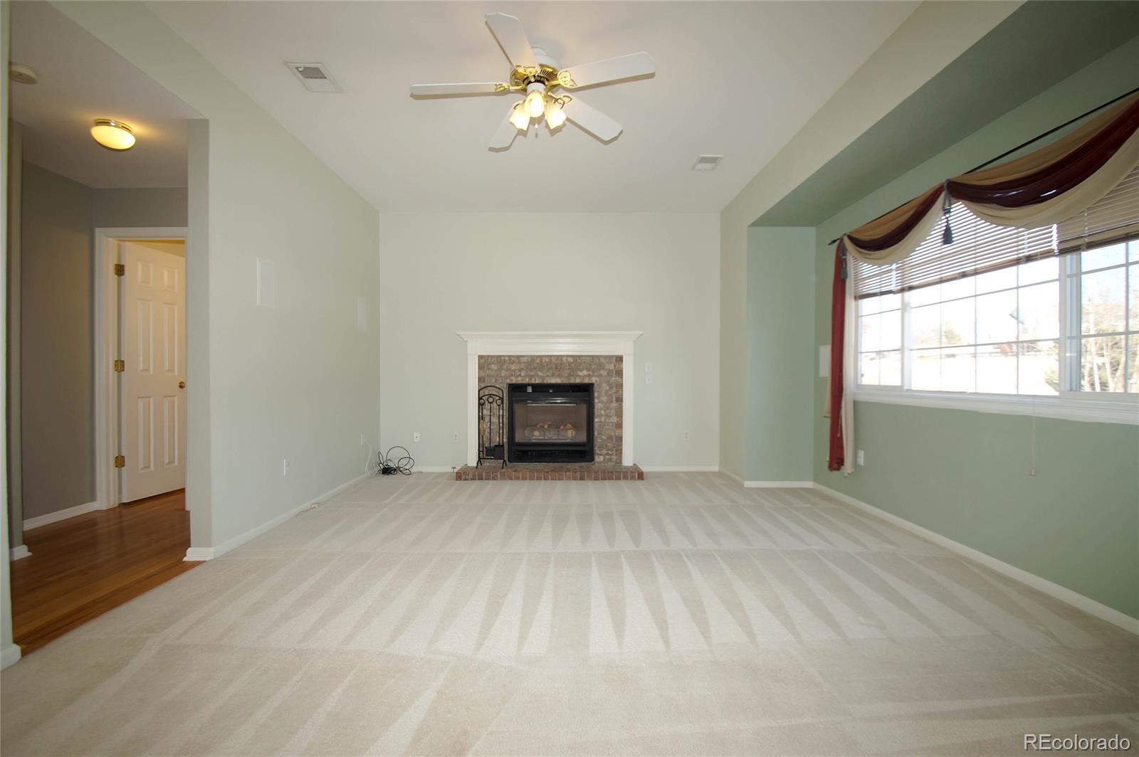 9638 Silverberry Circle Highlands Ranch, CO 80129 - Photo 9 of 27 a view of empty room with window